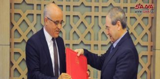 المقداد يتسلم نسخة من أوراق اعتماد السفير التونسي في سورية