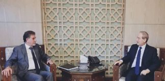 الوزير المقداد خلال استقباله السفير أنور عبد الهادي
