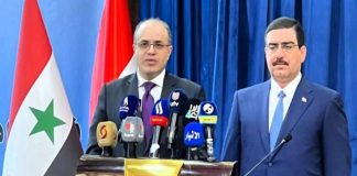 وزير الاقتصاد السوري مع وزير الاقتصاد العراقي