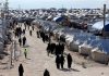 ترحيل عشرات العائلات العراقية من مخيم الهول إلى بلادهم